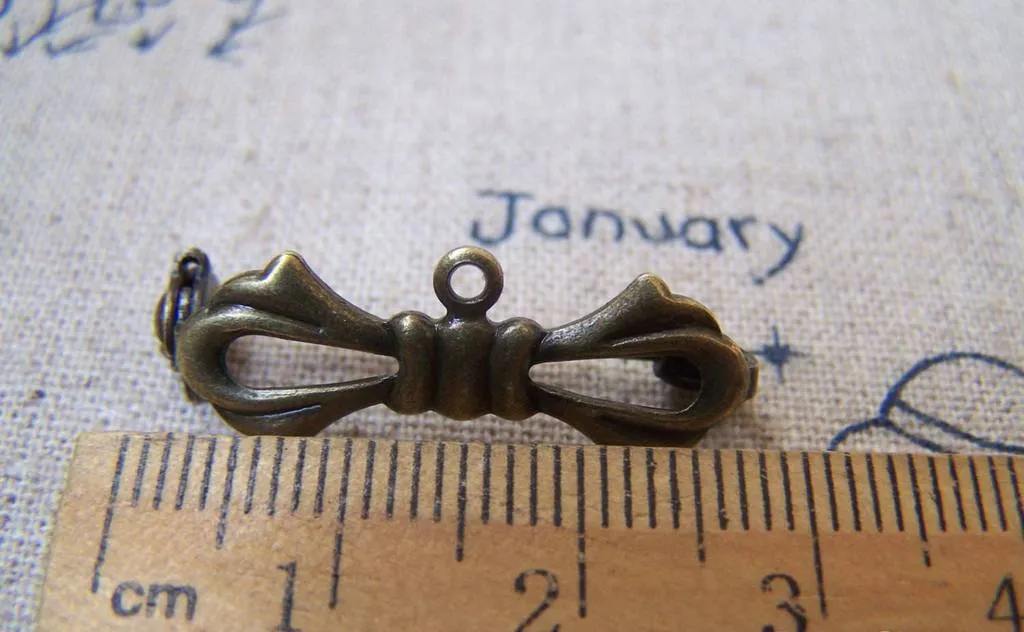 10 pcs Antique Bronze Bow Tie Safety Pin Brooch 10x27mm A3062