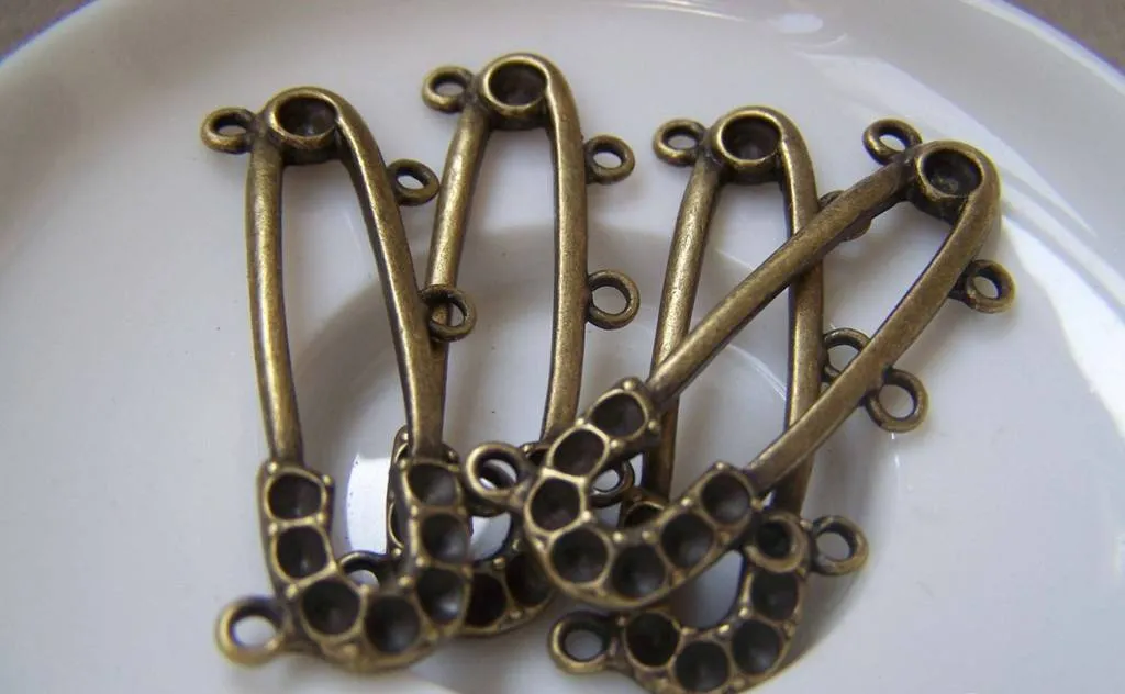 10 pcs Antique Bronze Five Loops Brooch Pendant A2215