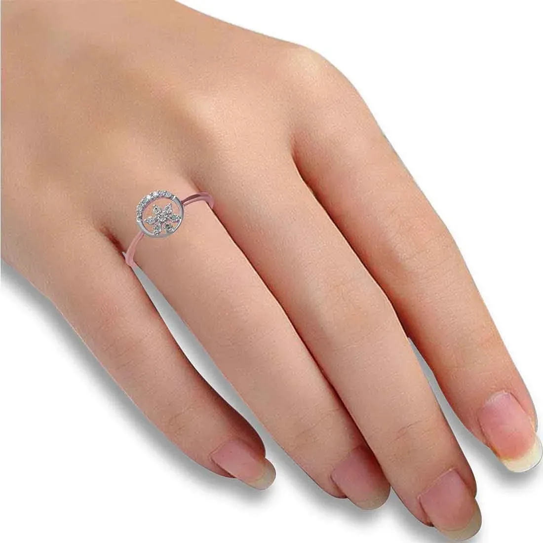 14K Rose Gold Ring Featuring A Circular Design And A Flower In The Centre