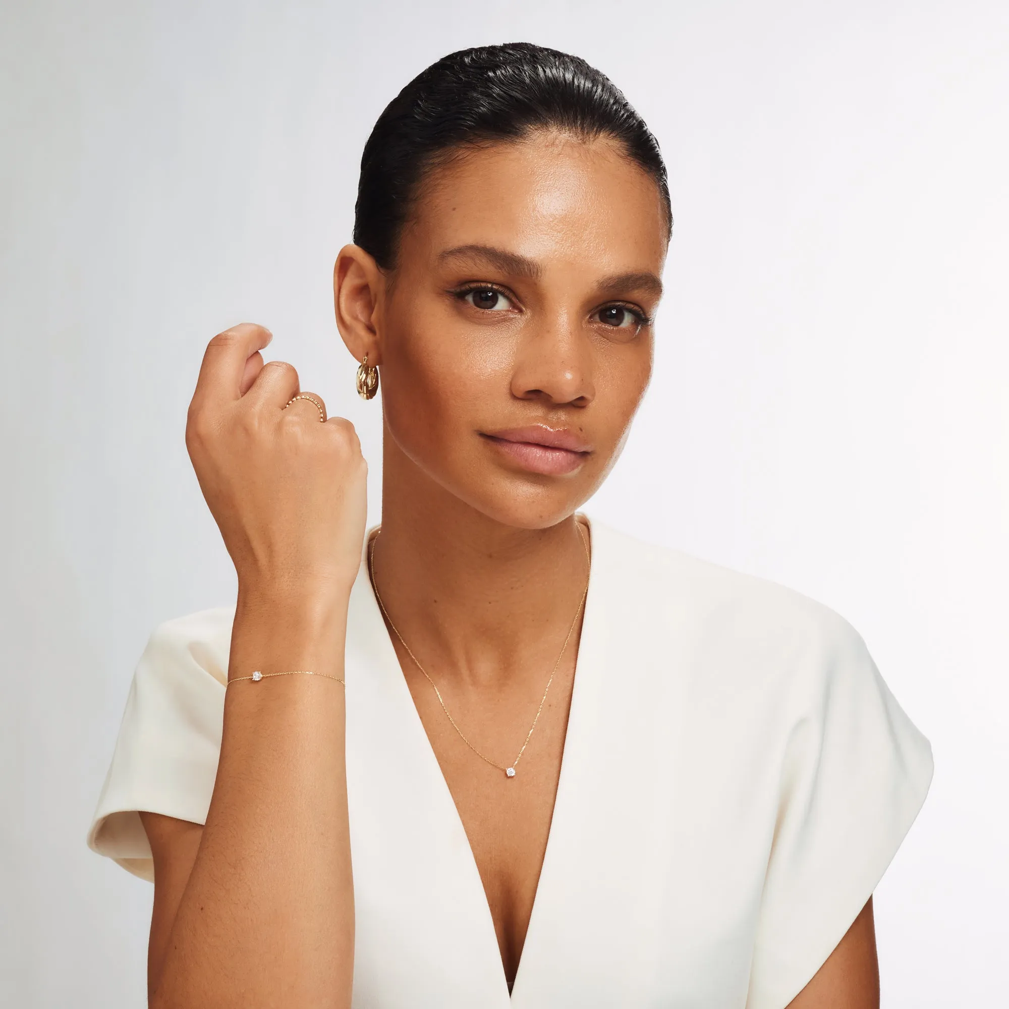 Cadeau d'Isabel 14 karat gold necklace & bracelet set with zirconia