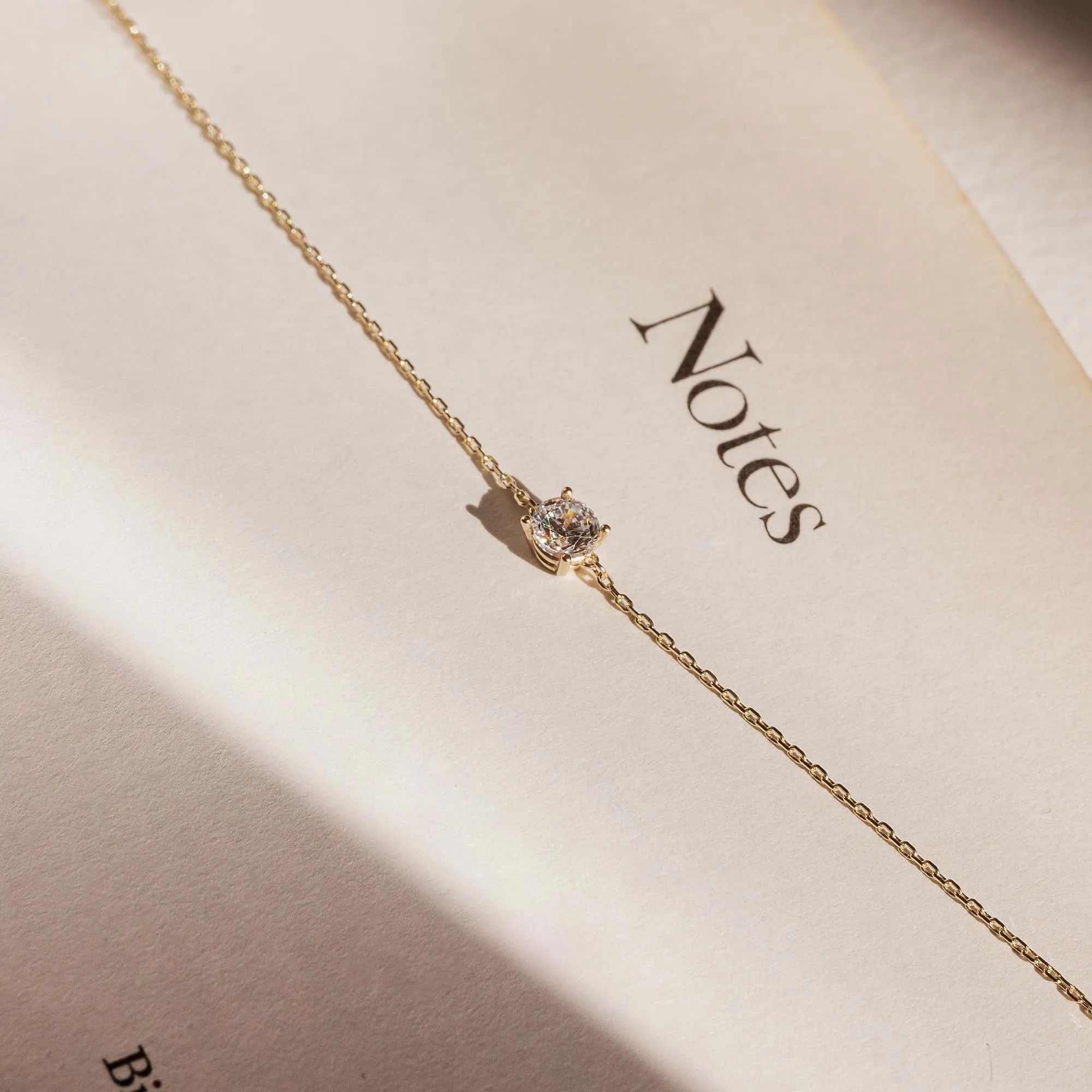 Cadeau d'Isabel 14 karat gold necklace & bracelet set with zirconia