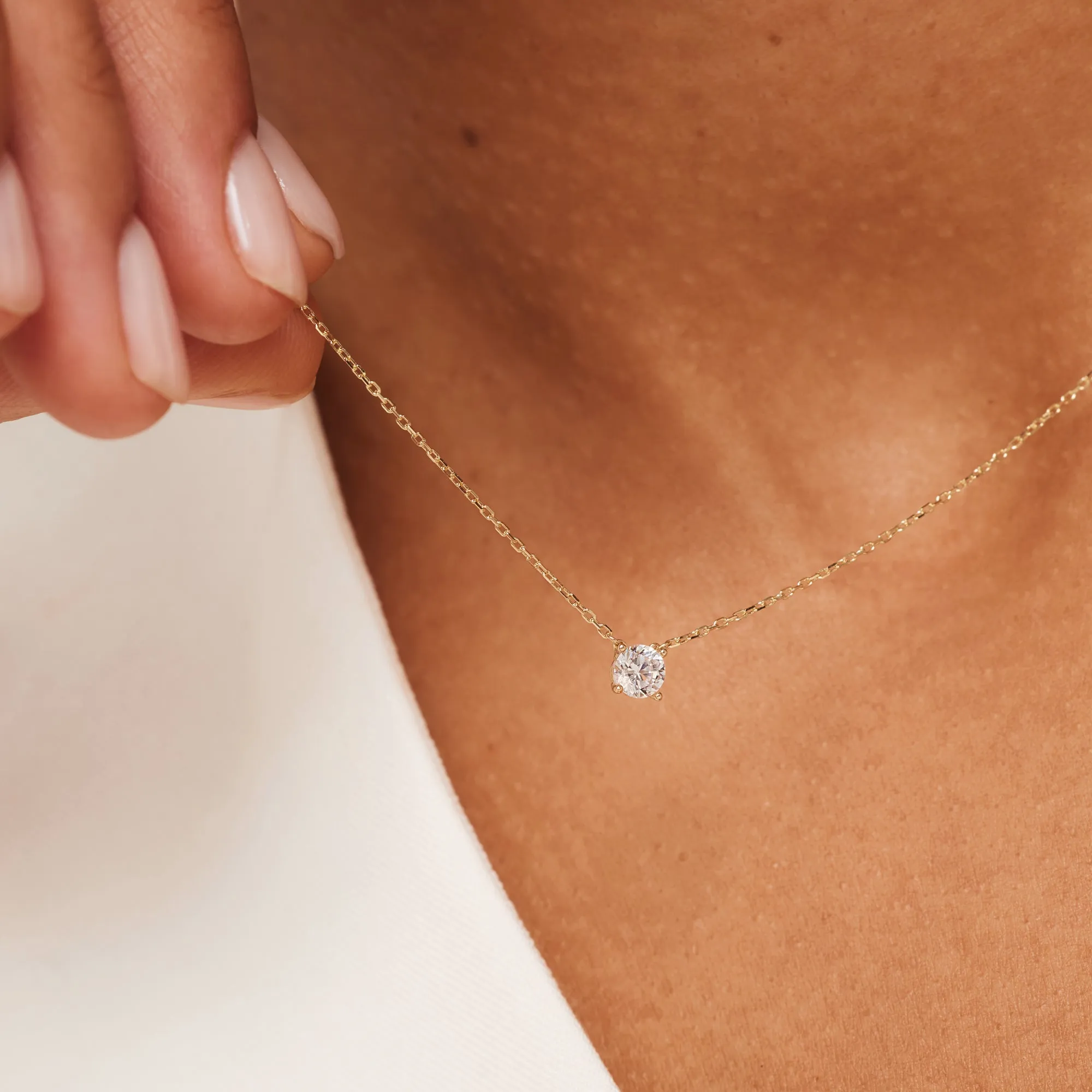Cadeau d'Isabel 14 karat gold necklace & bracelet set with zirconia