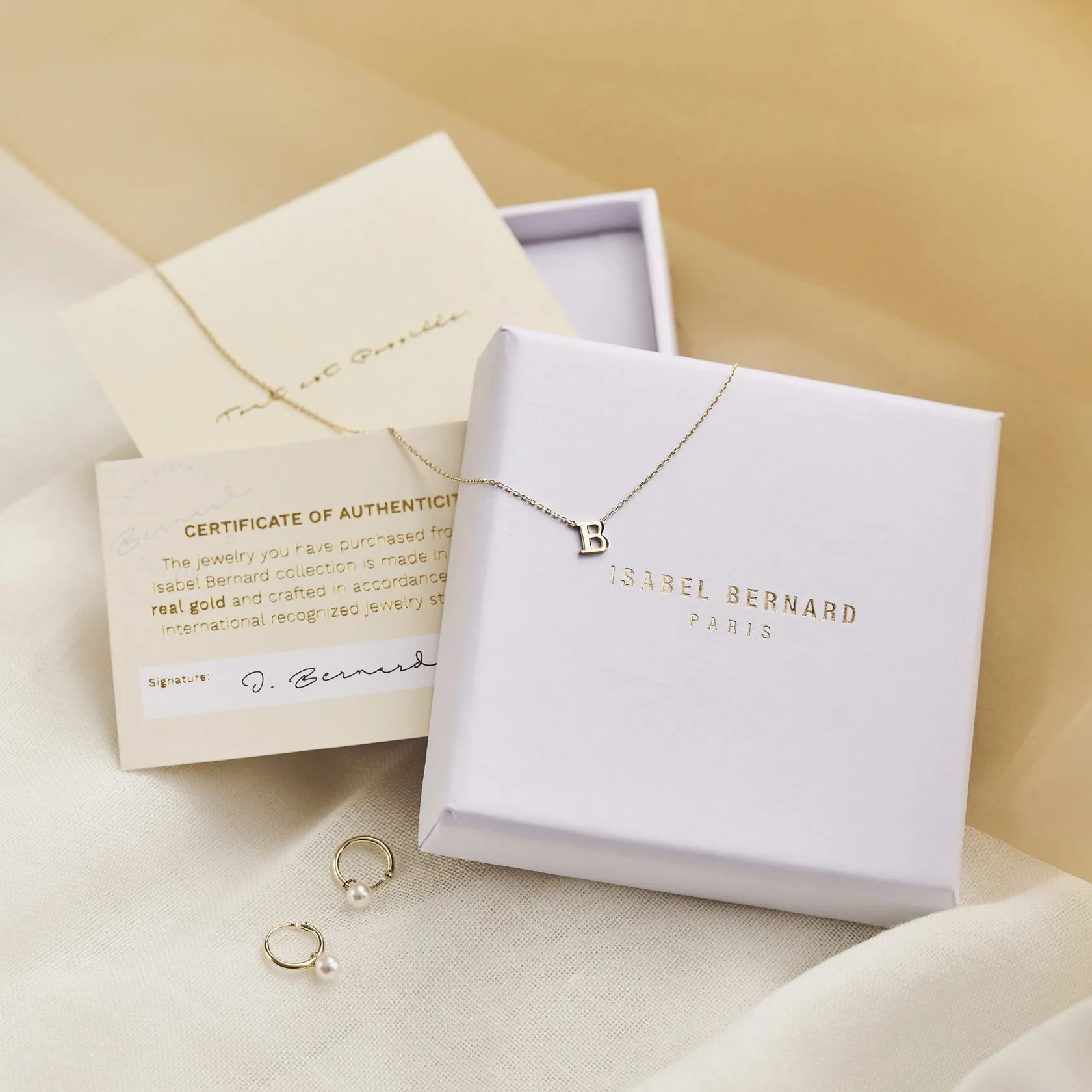 Cadeau d'Isabel 14 karat gold necklace and bracelet with pearls