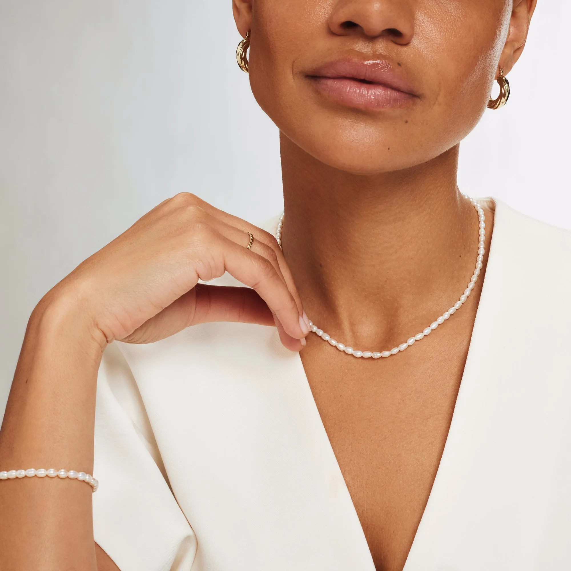 Cadeau d'Isabel 14 karat gold necklace and bracelet with pearls