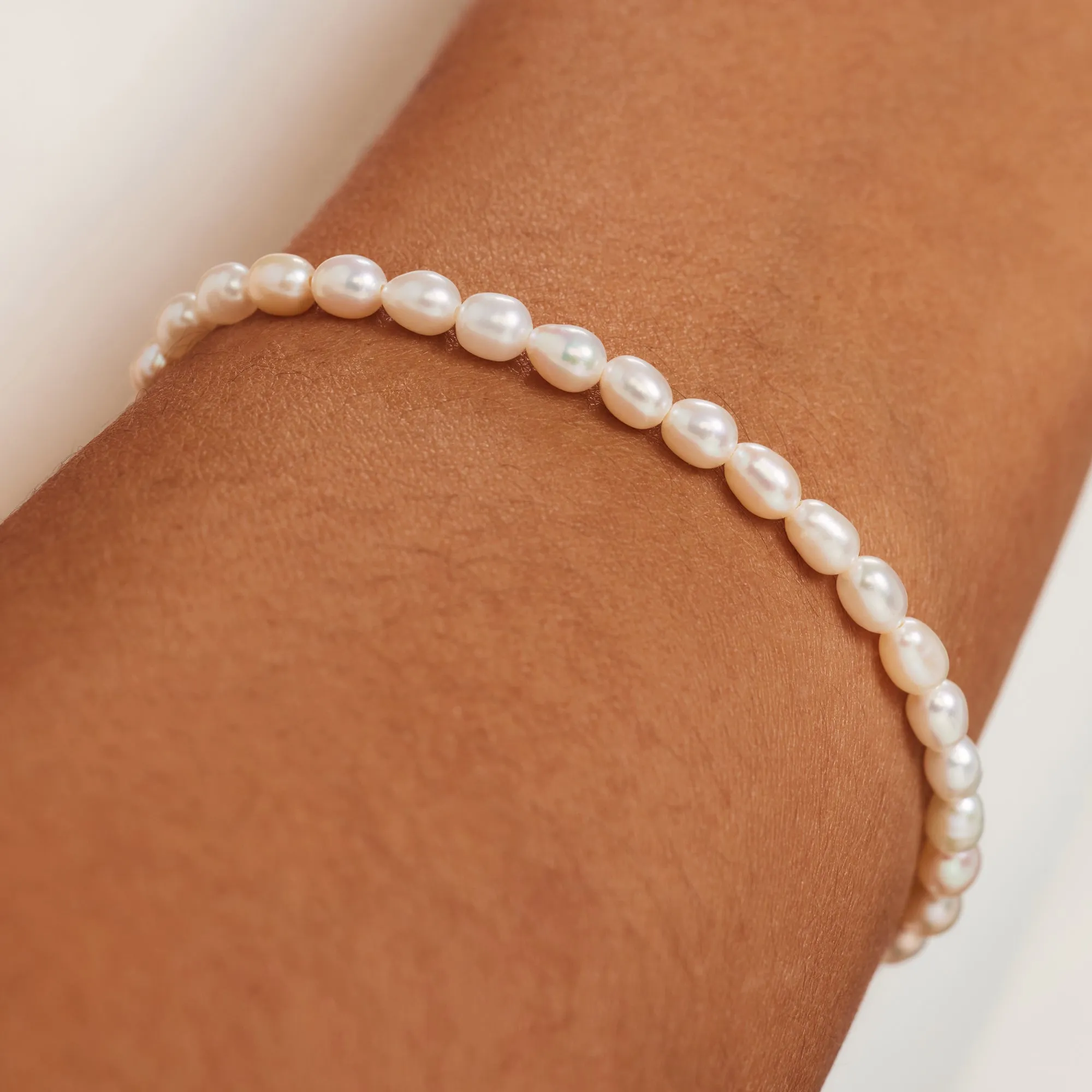 Cadeau d'Isabel 14 karat gold necklace and bracelet with pearls