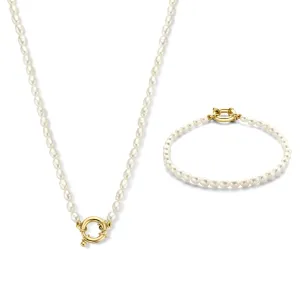 Cadeau d'Isabel 14 karat gold necklace and bracelet with pearls
