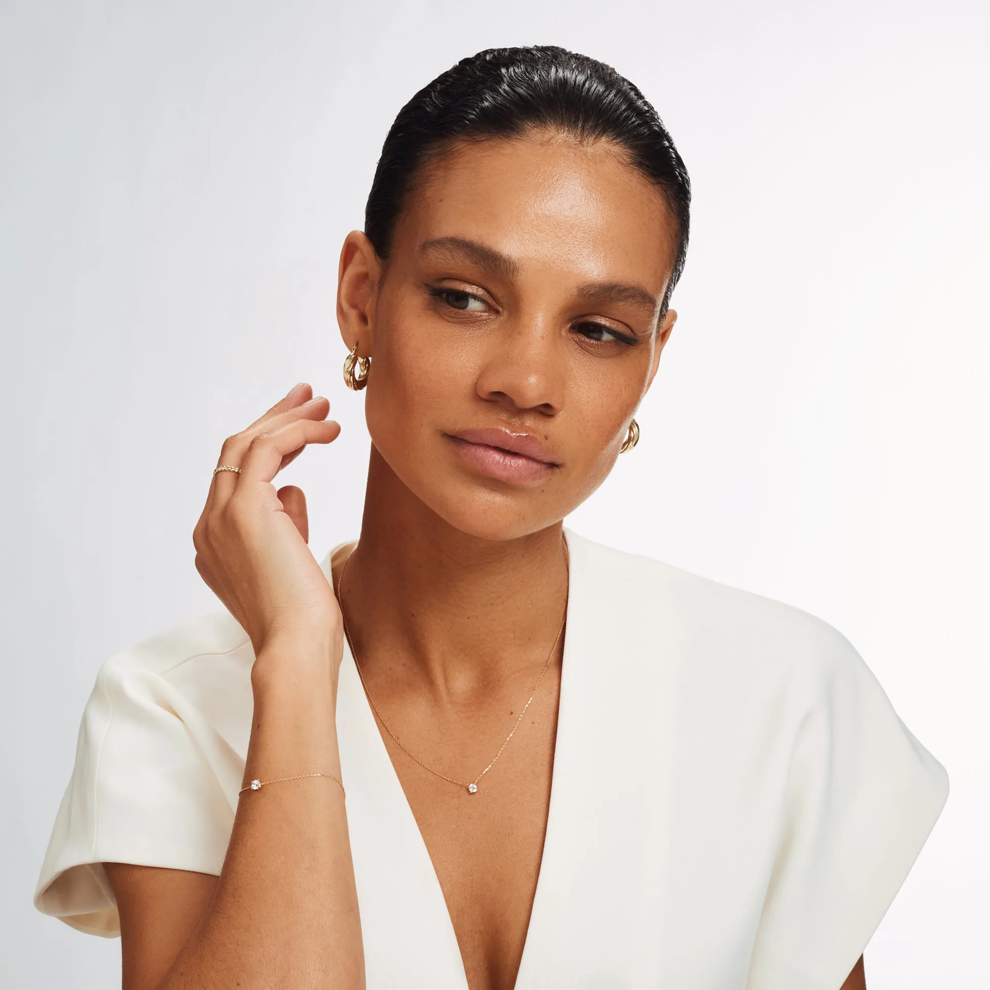 Cadeau d'Isabel 14 karat rose gold necklace & bracelet with zirconia