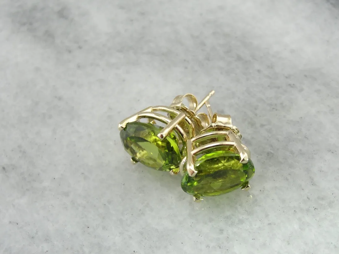 Large Oval Peridot Stud Earrings in Yellow Gold