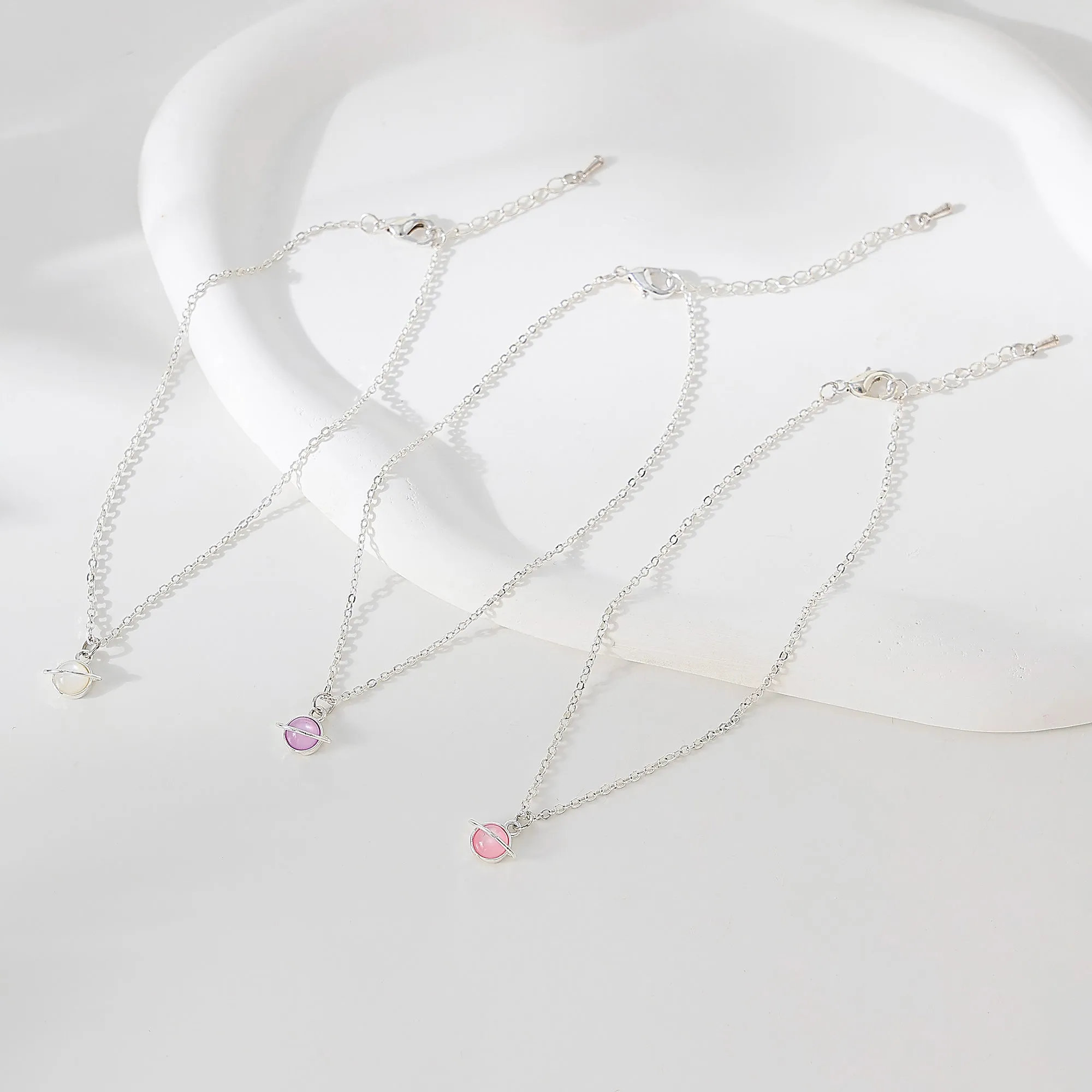Pink/White/Purple assorted Saturn charm on silvery chain Anklet