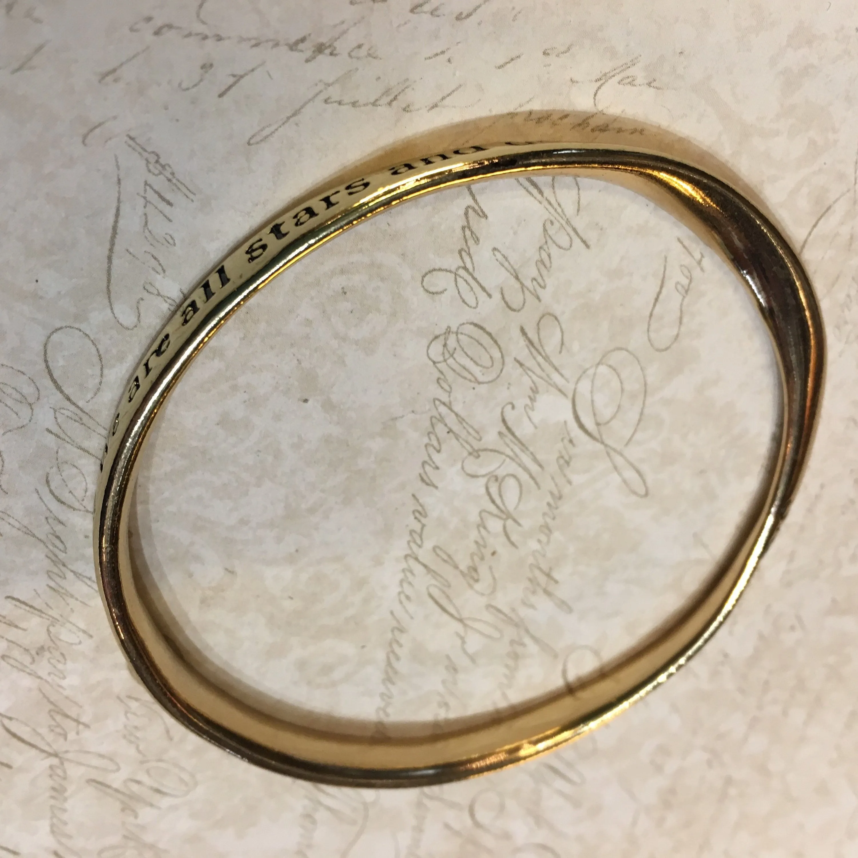 Shine... we are all stars and deserve to twinkle... gold tone metal Bangle Bracelet