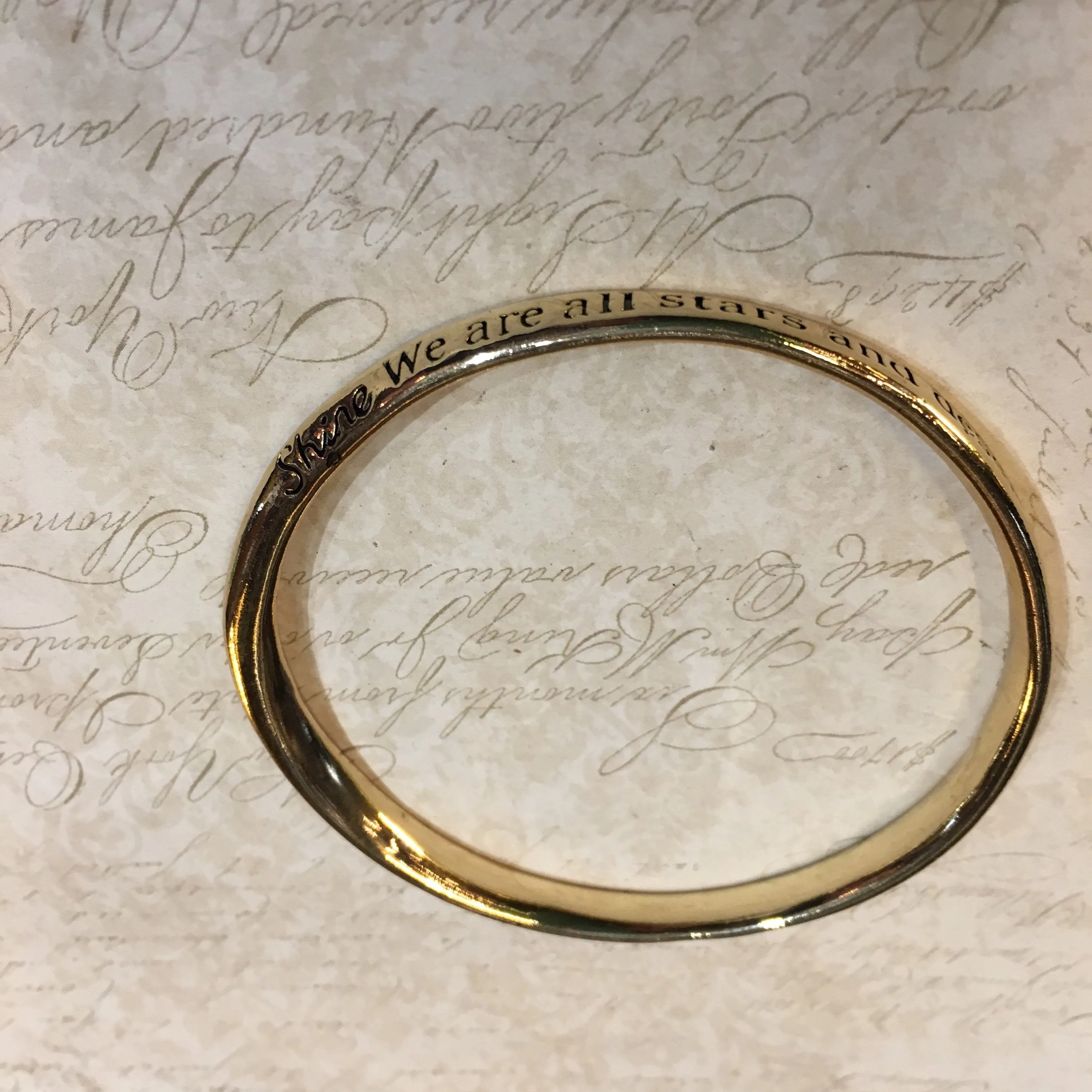 Shine... we are all stars and deserve to twinkle... gold tone metal Bangle Bracelet
