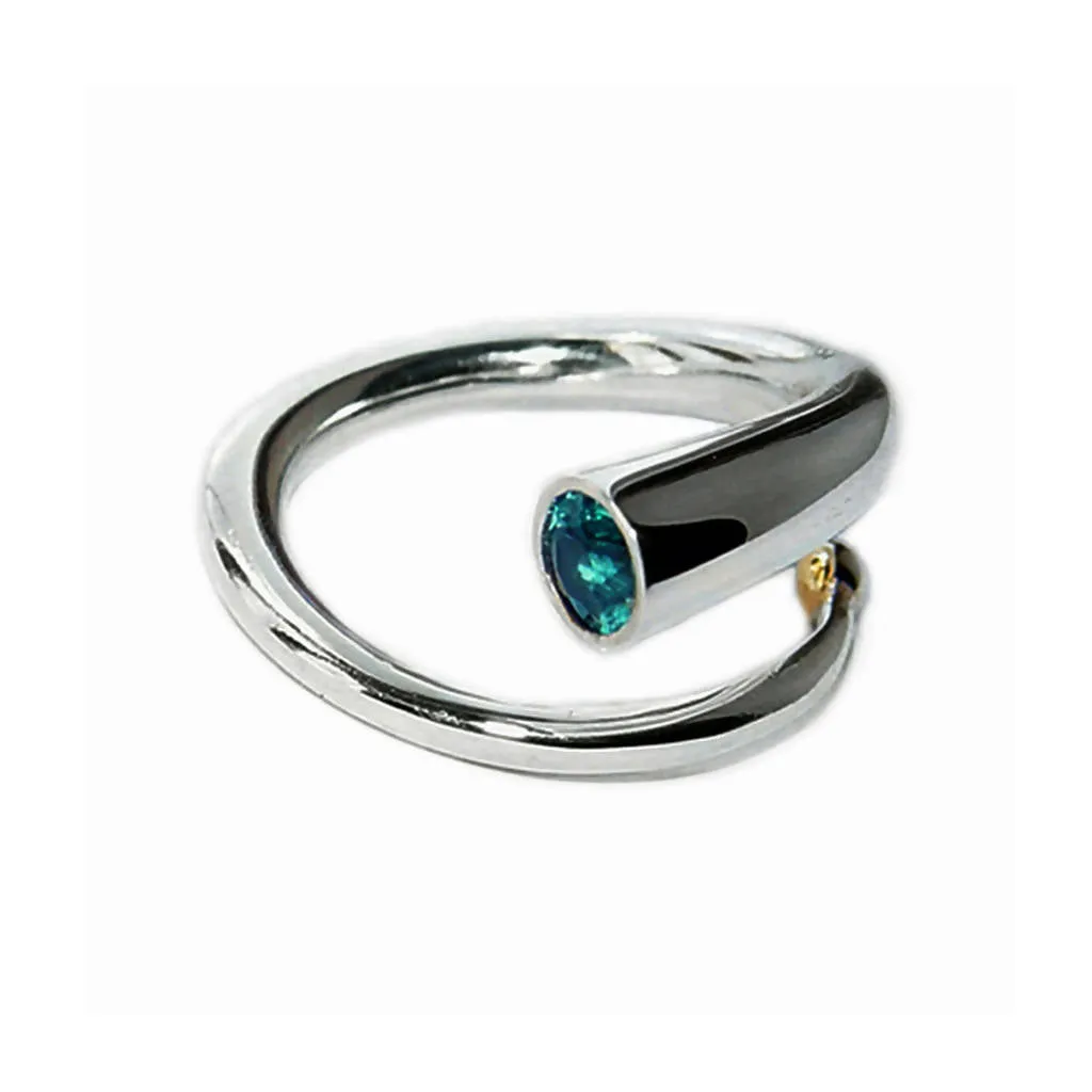 Silver spiral wiggly ring with blue topaz & 18K gold detail