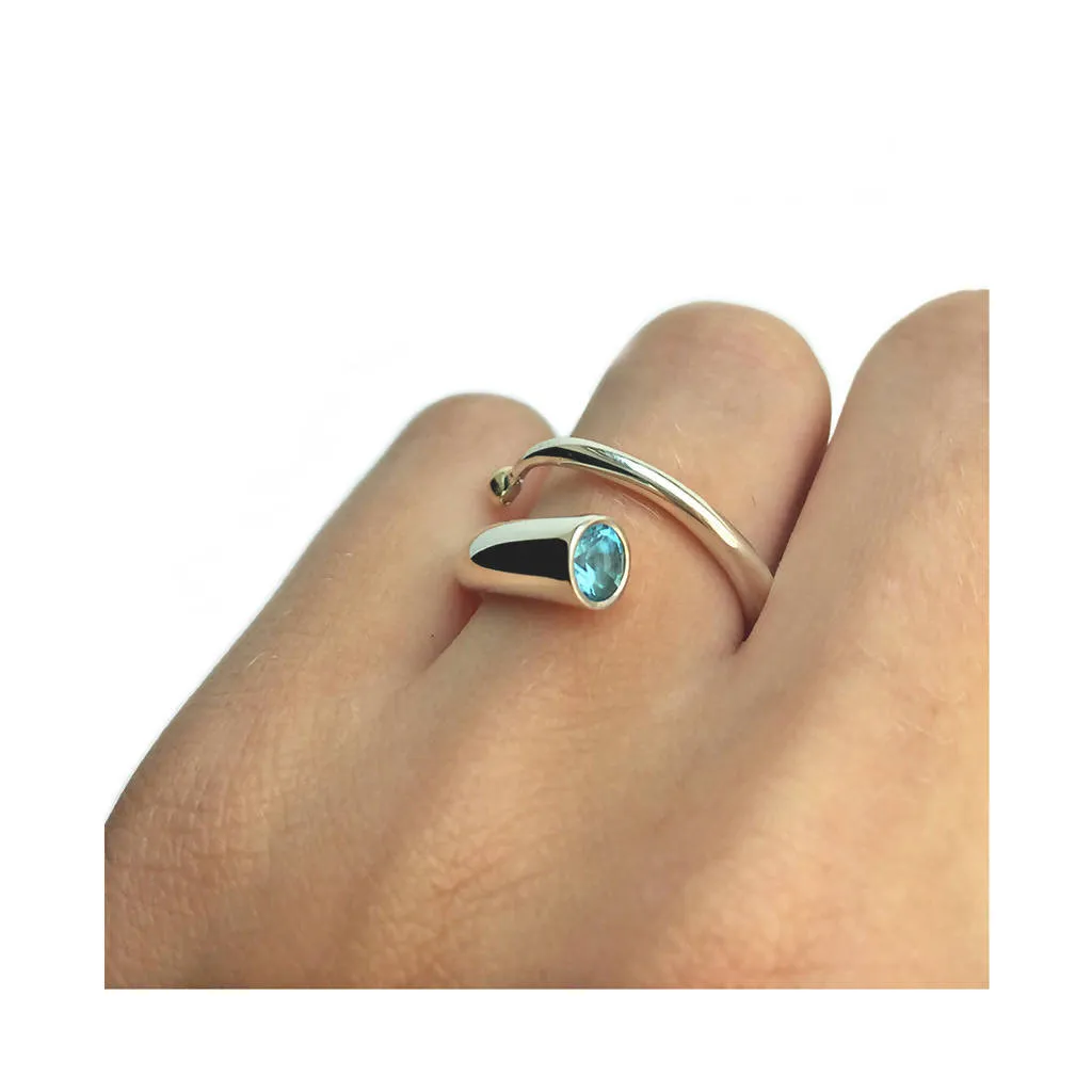Silver spiral wiggly ring with blue topaz & 18K gold detail